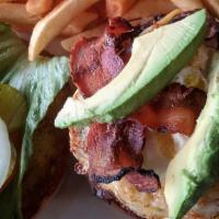 Loaded Monster Burger · Two 8 oz. juicy seasoned beef patties served with cheese, bacon, fried egg fresh jalapeño, s...