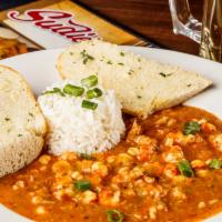 Crawfish Or Shrimp Etouffee · Served with rice and side salad. Your choice of seafood.