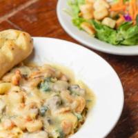 Magnolia Seafood Pasta · Sautéed with mushrooms, spinach in creamy magnolia sauce topped with Monterey Jack cheese. S...