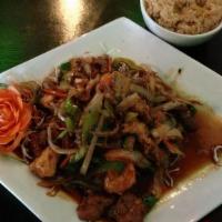 Mongolian Triple Delight · Chicken shrimp and beef with scallions in mongolian style. served hot and spicy.