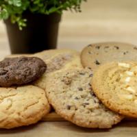 Home-Style Cookie Assortment – 1 Dozen · An assortment of home-style cookies.  Baker’s choice from any of the following:  Chocolate C...