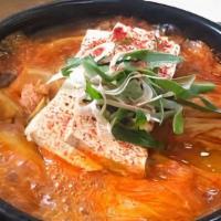 Kimchi Jjigae · Kimchi soup with pork.