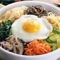 Chicken Bulgogi Bibim Bab · Assorted Korean vegetable, chicken bulgogi, fried egg, and steam rice with Korean spicy sauce.
