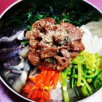 Pork Bulgogi Bibim Bab · Assorted Korean vegetable, pork bulgogi, fried org, and steam rice with Korean spicy sauce.