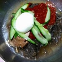 Bibim Naeng Myun · Cold bucket noodles, vegetable, egg, beef with spicy sauce.