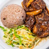 Oxtails (Large) · Tender and juicy oxtails marinated in special spices and stewed. Served with choice of rice ...