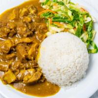 Curry Goat (Large) · Rice & Peas  with vegetables
or
Steam rice with vegetabl