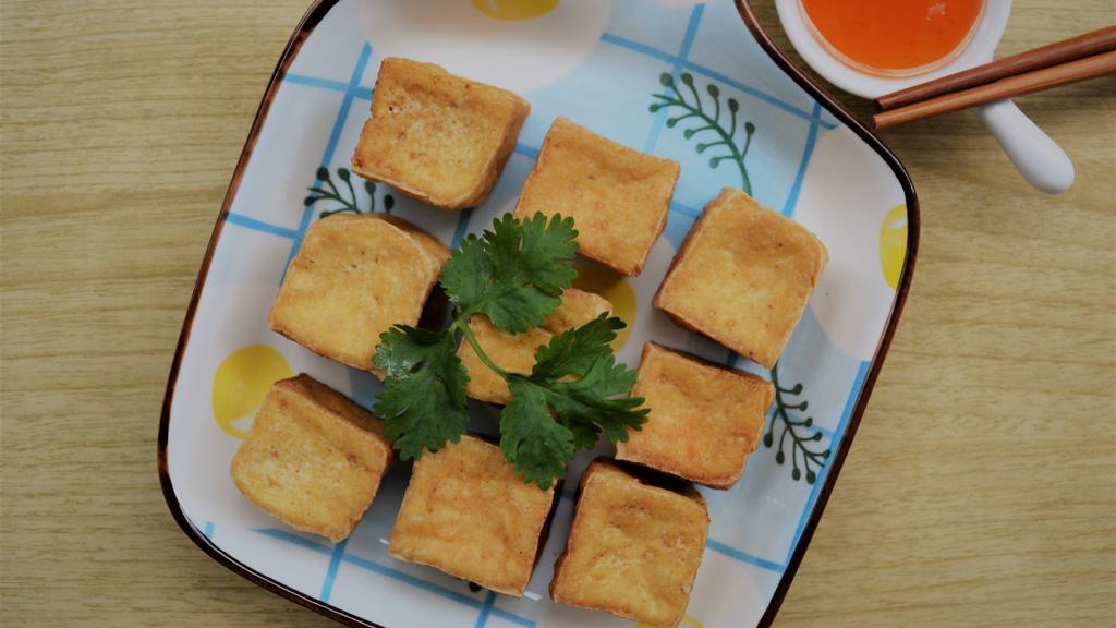 A8 Tofu Delight · Vegan friendly deep fried tofu serve with crushed peanut sweet & sour sauce.