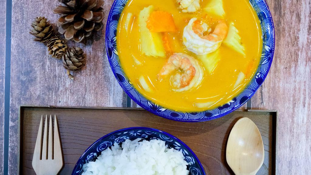 C2 Yellow Curry · No chili! Only cumin, coriander, turmeric, fenugreek, garlic yellow curry with your choice of Protein Yellow curry paste simmer in creamy coconut milk, cubed potatoes, diced yellow onions, and sliced carrots. Sever with Thai jasmine rice. This one is about level 1 spicy.