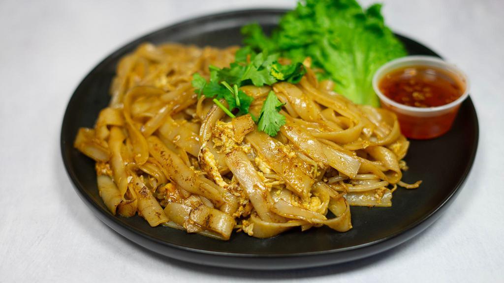 N7 Gai Kua Flat Noodles · Stir fried flat noodles with your choice of meat, egg, pickle radish, beansprouts and green onions. Serves with side green leaf lettuce and sweet and sour sauce.