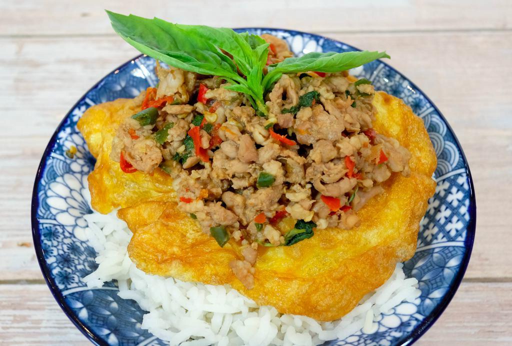 R1 Omelet Kra Pow · Our basil stir-fried is one of the most popular dish with 1 egg omelet. Your choice of ground protein, garlic, bell peppers, mushrooms, Thai basil, with house basil chili sauce on topped of Thai style egg omelet. Serve over jasmine rice. Spicy level 3
