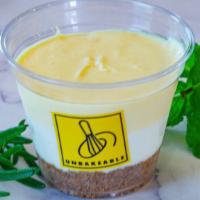 Uc8 Mango Cheesecake · Creamy cheesecake with mango 
Contain: Mango, cream cheese