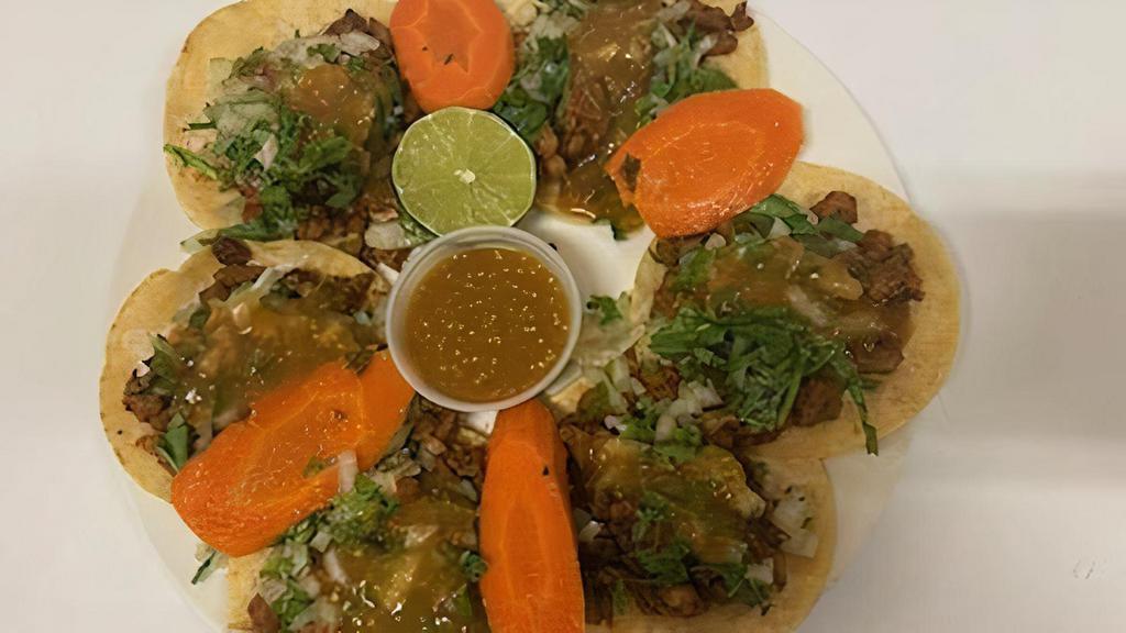 Tacos (Street Tacos) · Street taco style with onions, cilantro with your choice of meat. limes and salsas included.