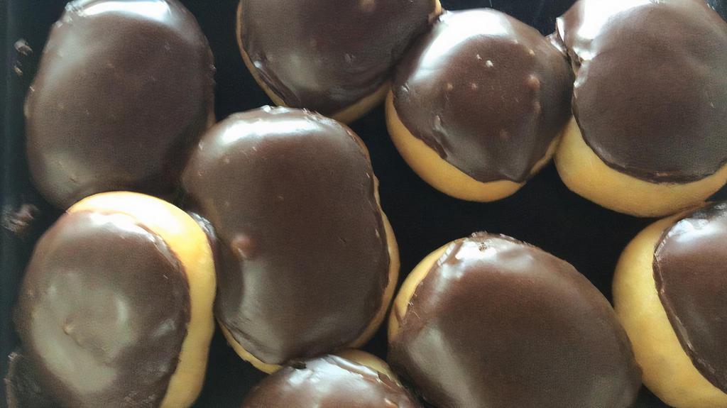 Chocolate Donut Holes · Bite sized chocolate donuts! Dozen of chocolate donut holes! (12 in a bag)