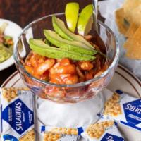Shrimp Cocktail · Juicy, tender gulf shrimp mixed in authentic shrimp cocktail sauce, topped with sliced avoca...