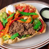 Mama Juanita'S Taco Salad · Served on a crispy taco shell with your choice of meat, served with green mix lettuce, tomat...