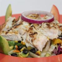Mestizos Salad · Grilled chicken breast strips on top of a mixed green salad. Topped with roasted poblano pep...