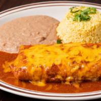 Chimichanga · Homemade flour tortilla stuffed with your choice of meat, deep fried, topped with beef gravy...