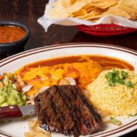 La Ternerita · 4 oz of beef fajitas steak served over grilled onions, one cheese enchilada. Served with gua...