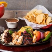 El Puas · Your choice of sauteed shrimp, beef, chicken or combo fajitas with grilled (onions, tomatoes...