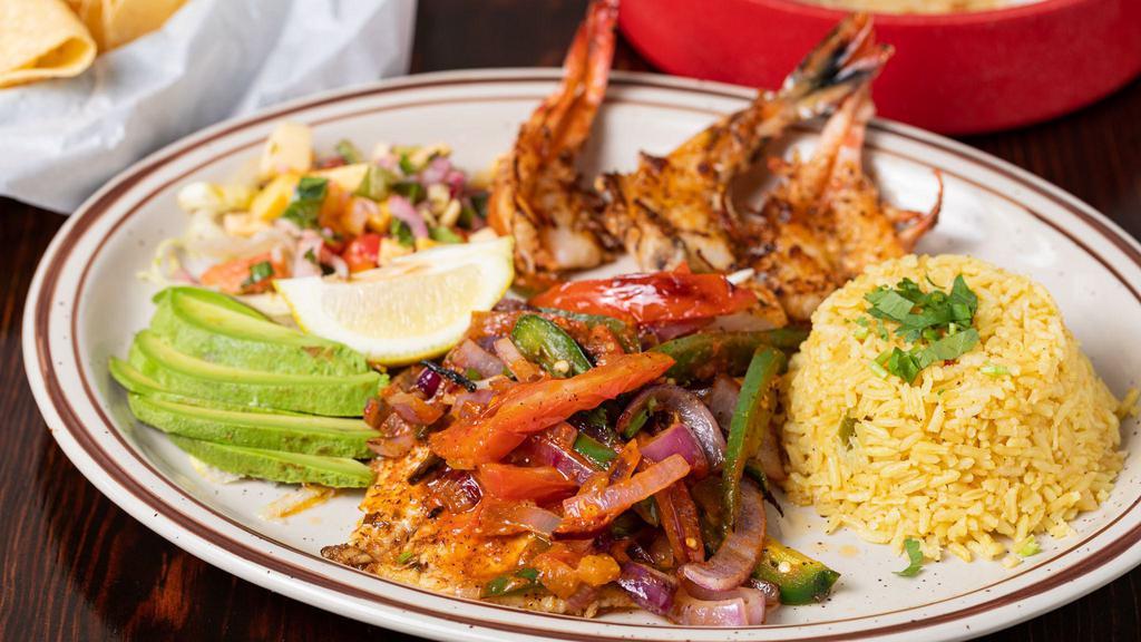 Tilapia & Diablo Shrimp · Blackened tilapia fillet with 3 large grilled shrimps with rice and charro beans. Served with mango pico de gallo and sliced avocado.