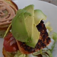 Salmon Burger · Fresh salmon, onions, tomatoes, avocado, low-fat chipotle mayo, lettuce. Served with your ch...