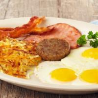 Rustler'S Roundup · Three eggs, your style, with sausage, grilled ham and bacon