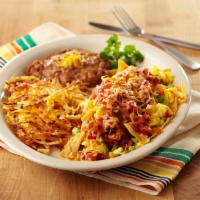 Migas · Three eggs scrambled with diced bell peppers, tomatoes, onions, corn tortilla strips and fro...