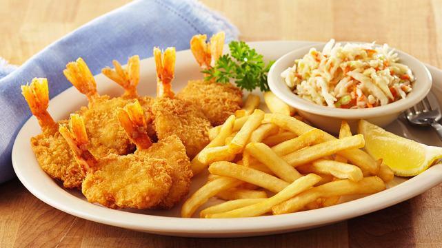 Fried Shrimp Platter · Lightly breaded, golden brown shrimp served with French fries, coleslaw and Texas toast.