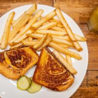 Patty Melt · 1/2 lb. Char grilled burger sandwiched between grilled rye with melted american cheese and s...