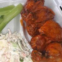 12 Wing Combo · Two flavors and six celery sticks one side and two dipping sauces served with sliced bread a...