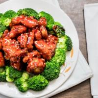 Sesame Chicken · Battered white meat chicken chunk, deep fried and sautéed with broccoli in sweet brown sauce...