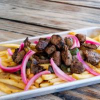 Steak Frites · Tender beef, onion, green bell pepper, pickled red onions over fries