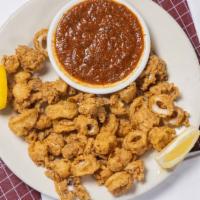 Calamari · Lightly breaded and fried, served with Zorba's spicy tomato sauce.