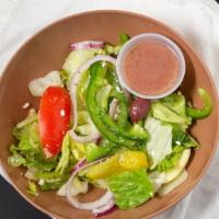 Greek Salad · Romaine and iceberg lettuce, tomatoes, cucumbers, bell peppers, Kalamata olives, feta, onion...