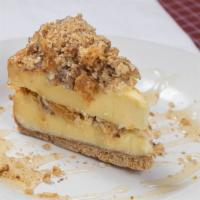 Baklava Cheesecake · Baklava sandwiched between a delicious cheesecake, topped with honey and walnuts.