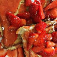 Strawberry French Toast · Topped with fresh strawberries and homemade strawberry glaze.