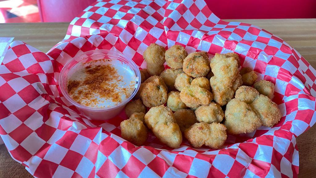 Fried Okra · Fried okra topped with Cajun seasoning & served with Cajun Ranch