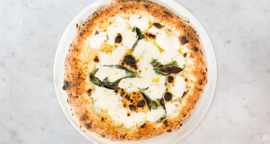 White Pizza · Fresh mozzarellaa, parmesan, basil, oregano, garlic, and extra virgin olive oil. No tomato sauce.