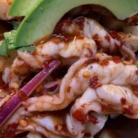 Aguachile · Shrimp marinated in lime juice and with a sauce of your choice (verde, rojo, mango habanero).