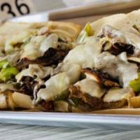 Steak Philly · Thin sliced beef grilled to perfection served on a 10 inch hoagie roll imported from Philade...