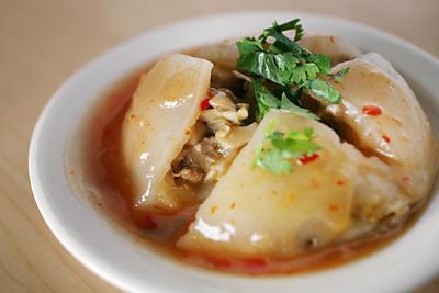 Rice Ball · Pork, bamboo shoots and mushroom wrapped in a rice wrap served with sweet chili sauce.