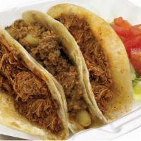 Taquitos De Harina · Order of 3 Flour Tortilla filled with refried beans and your choice of meat: Picadillo, Pork...