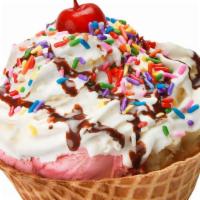 Cazuela Deluxe · A waffle bowl with  three scoops of ice cream, whipped cream, chocolate syrup, sprinkles & a...
