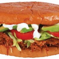 Torta De Tinga De La Gaby (Spicy) · Shredded chicken in our house special sauce, beans, mayo, lettuce, tomato, avocado and sour ...