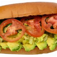 Torta Vegetariana · A generous portion of  Avocado with lettuce, tomato,spinach, cucumber and jalapeño on the si...