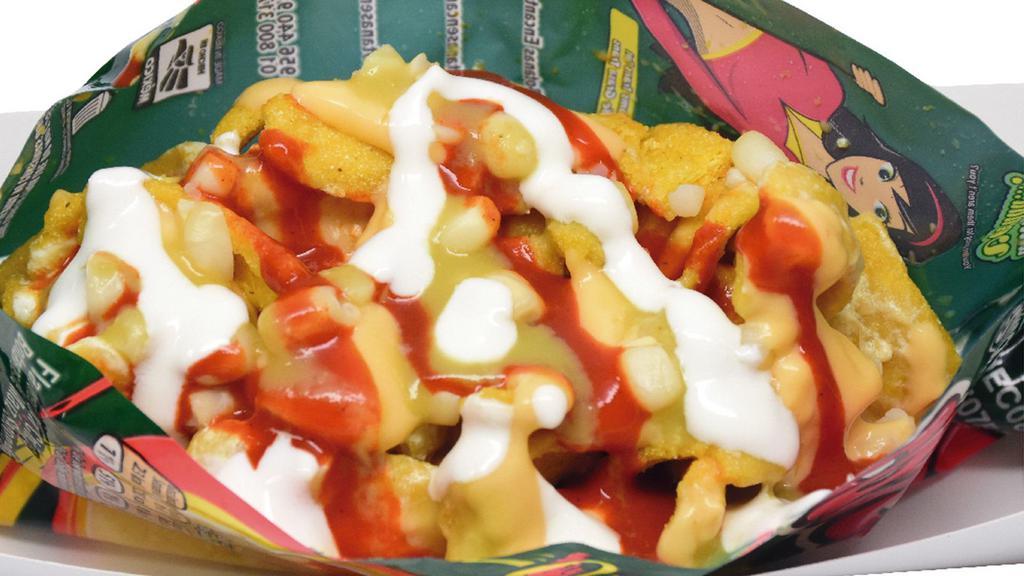 Specialty Chips -Los Preparados · Your can choose:  Conchitas or Hot Cheetos or Takis or Tostitos chips with yellow or white corn, nacho cheese, sour cream, and hot sauce.