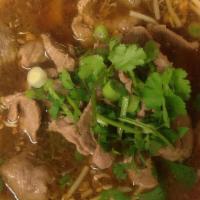 Thai Beef Noodles · Beef soup, sliced beef, bean sprouts, green onions and cilantro.