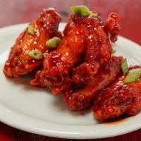 Wings - Honey Sambal · Crispy chicken wings  served with either our housemade buffalo or honey sambal, you pick! Go...