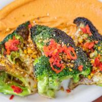 Charred Broccoli · Broccoli served with a bold romesco sauce, fresno chilis, and pistachio crumble.. *Nut Allergy